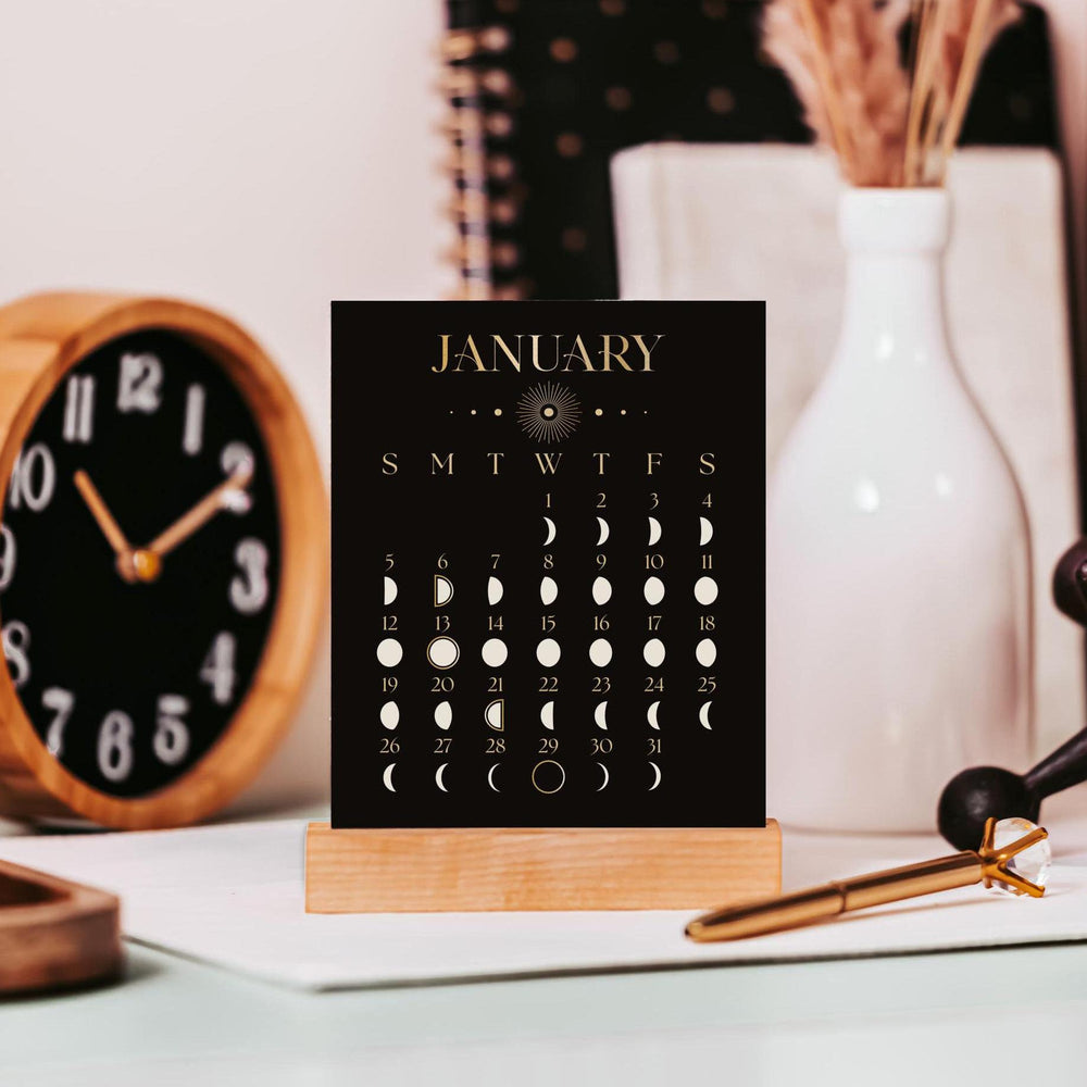 
                      
                        the 2025 january calendar card for the black and faux gold moon phase desk calendar
                      
                    