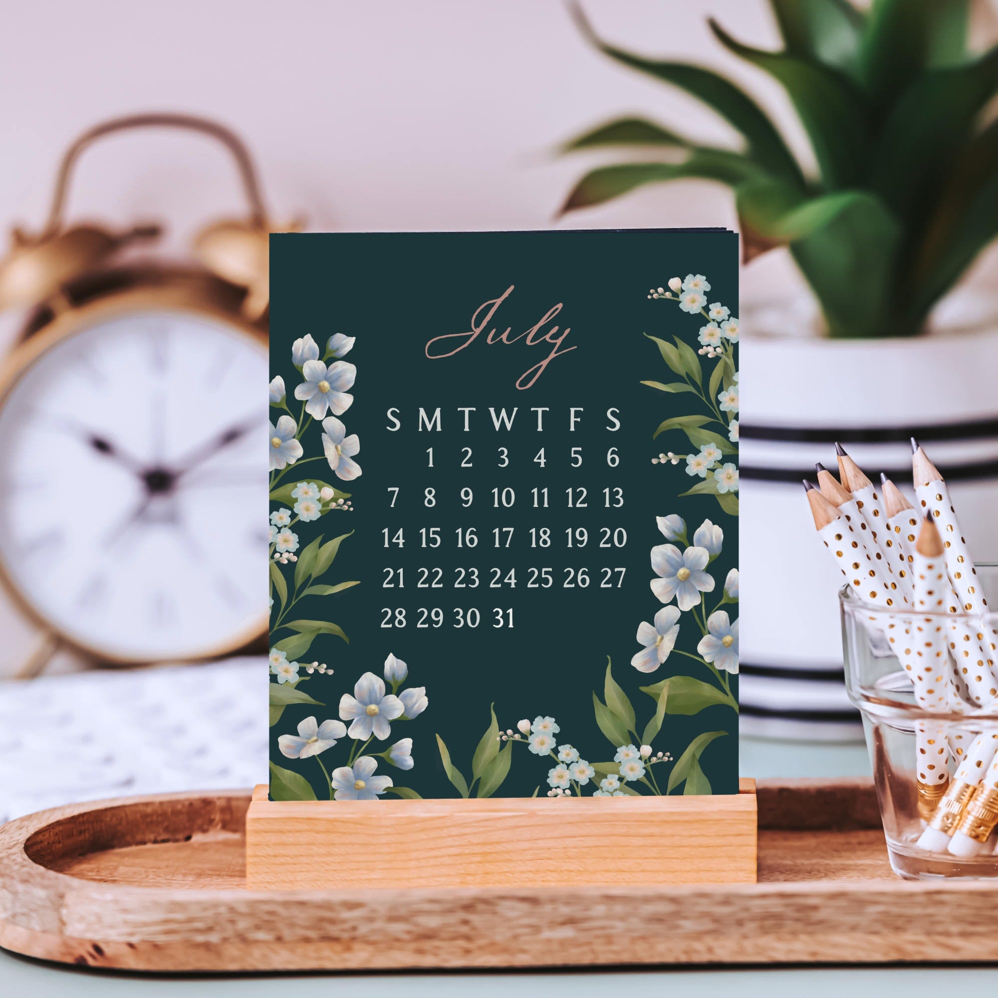 small floral desk calendar with wooden stand